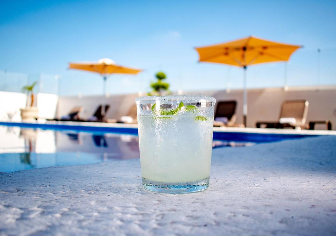 Hotel Stadium León Exterior foto A glass of lemonade