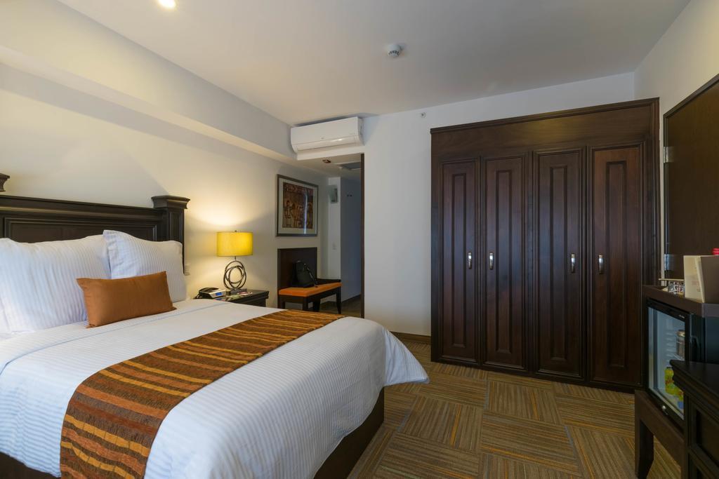 Hotel Stadium León Exterior foto A bedroom at the hotel